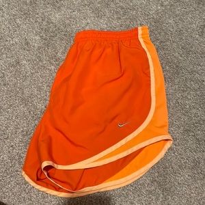 Orange women’s Nike shorts